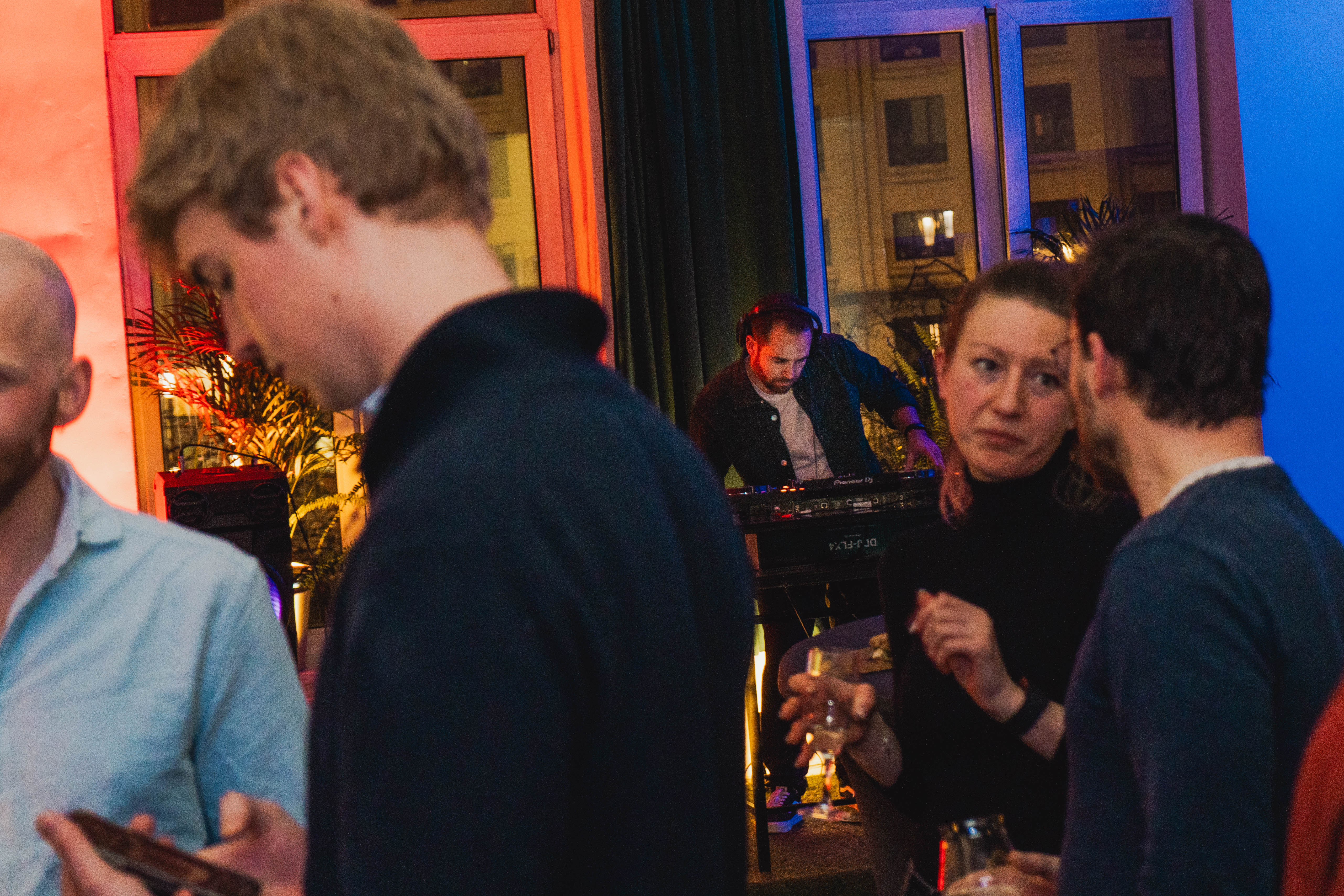 BLOCK25 evening party with DJ and colorful lighting